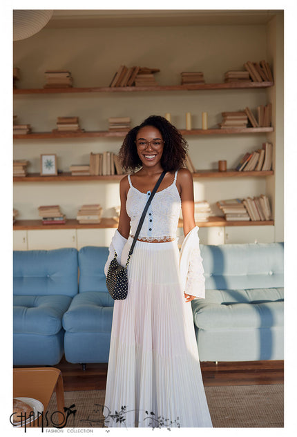 Tiered pleated maxi skirt in cream white with flared tiered hem