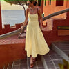 Sleeveless Smocked Bodice Dress with Flared Hem
