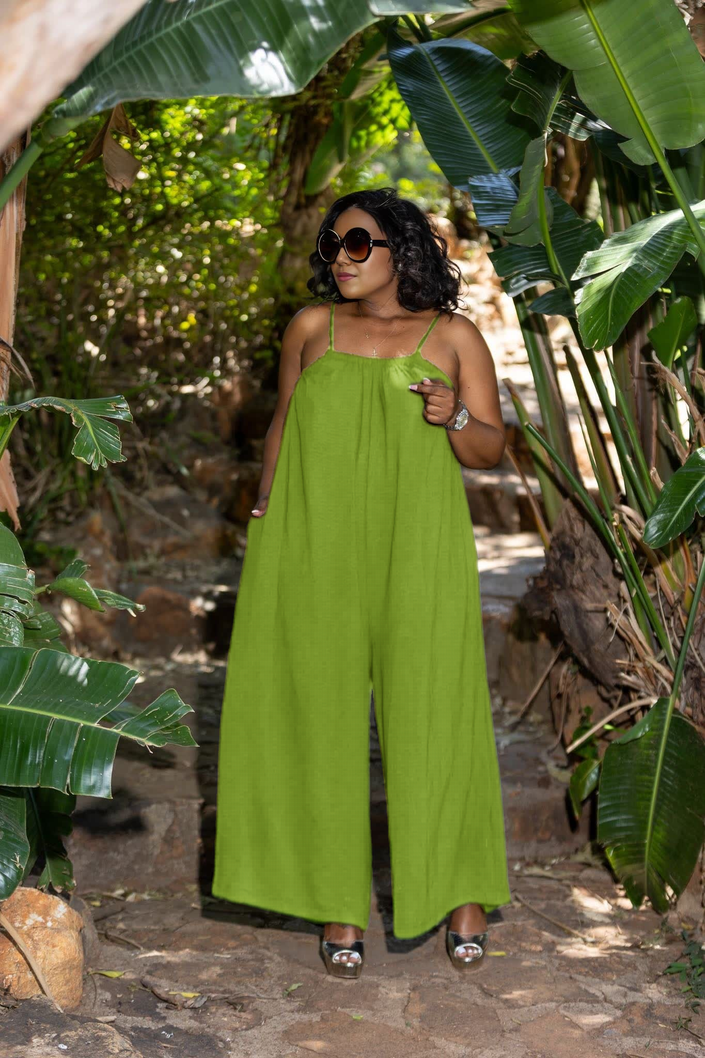 Green loose-fit sleeveless jumpsuit with wide legs and spaghetti straps