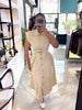 Two-piece Sleeveless Collared Top and High-waisted Asymmetrical Hem Button Skirt