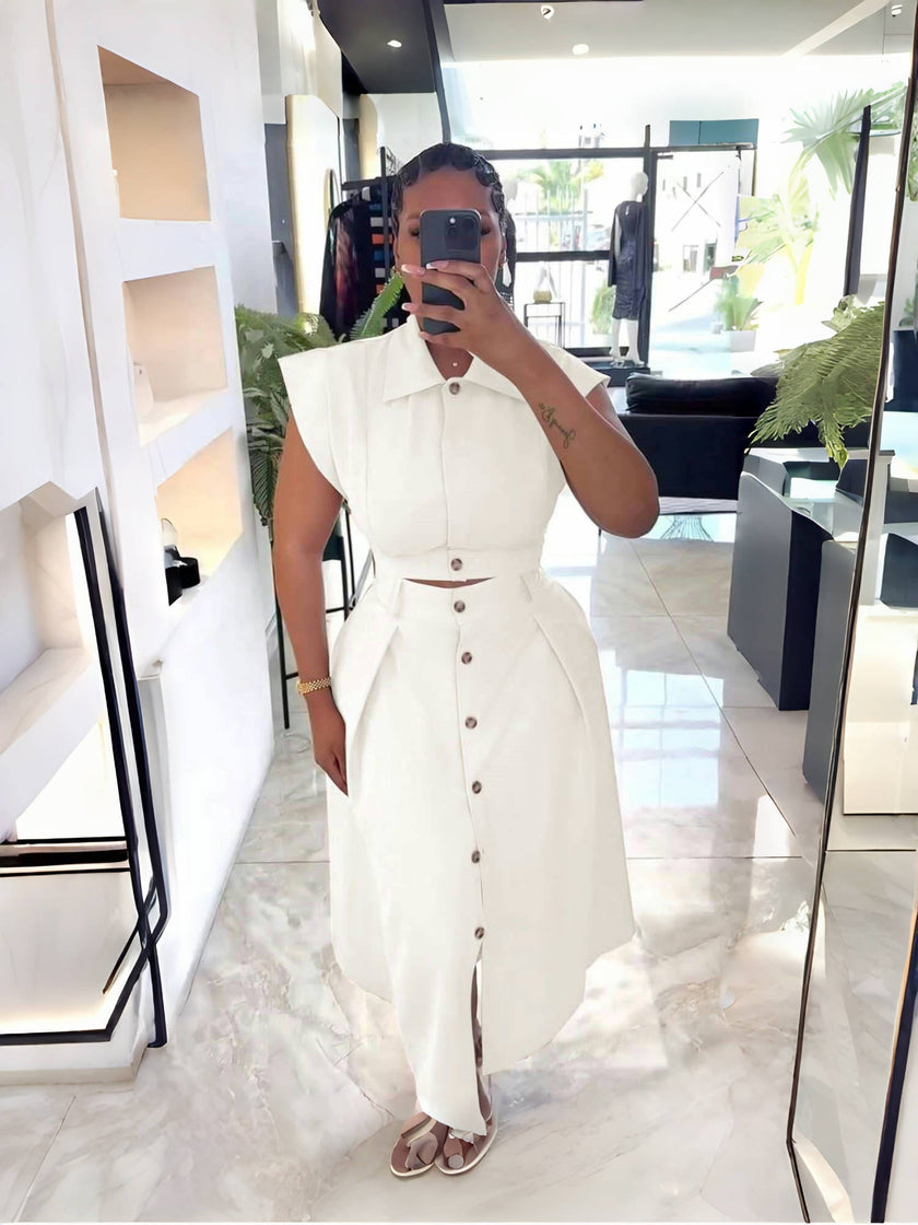 White midi shirt dress with button front, belted waist, asymmetric hem