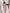 Two-piece Sleeveless Collared Top and High-waisted Asymmetrical Hem Button Skirt