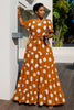 Tiered polka dot midi dress in brown with white spots, short sleeves, belted waist