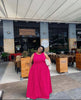 Deep-pink sleeveless maxi dress with gathered stretch waist and round neckline
