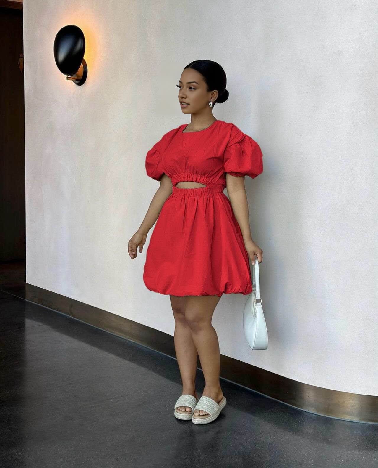 Red mini dress with puff sleeves and cut-out waist