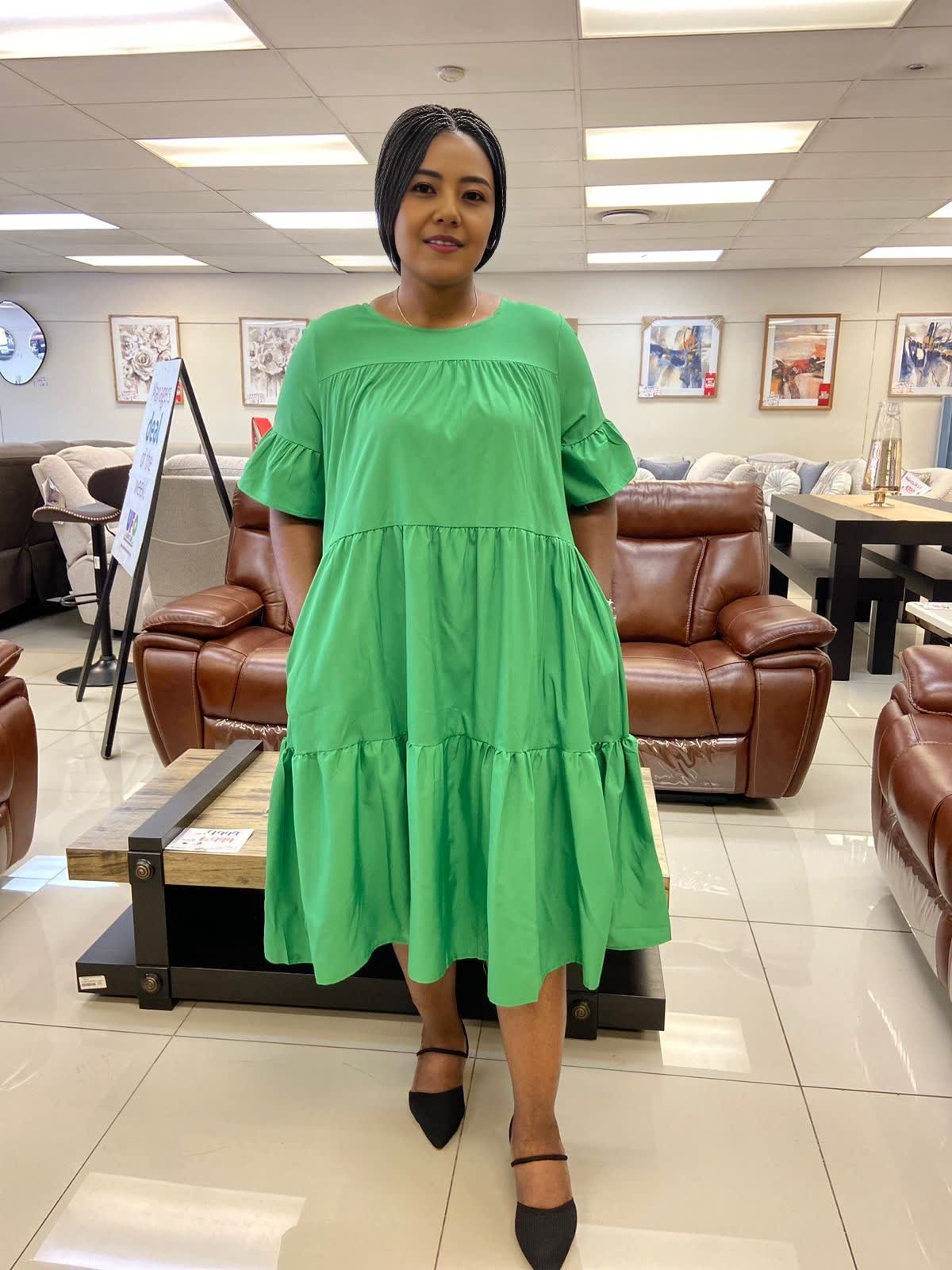 Lime-green ruffle midi dress with tiered hem, loose fit and short sleeves