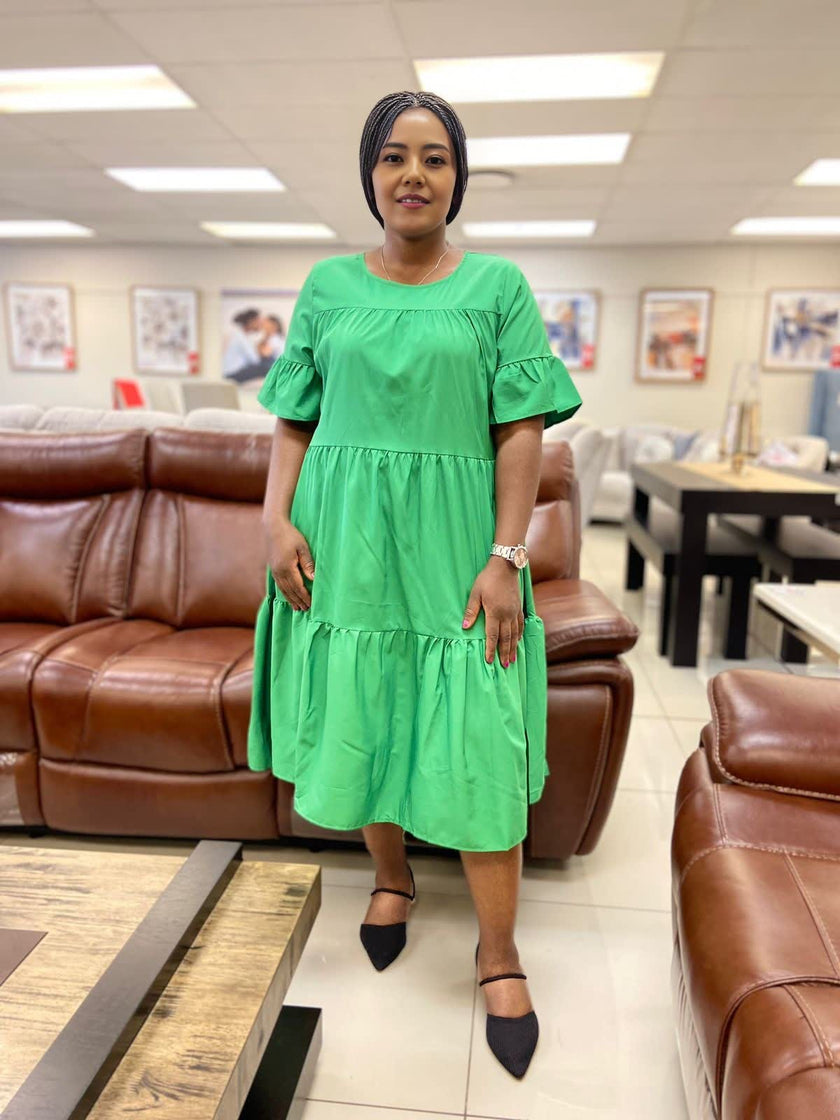 Lime-green ruffle midi dress with tiered skirt, loose fit and short sleeves