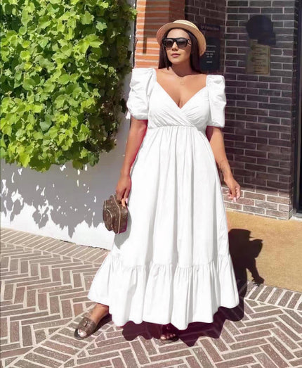 White puff-sleeve maxi dress with V-neck and ruffle hem
