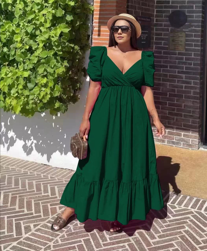 Dark green puff-sleeve maxi dress with V-neck and ruffle hem