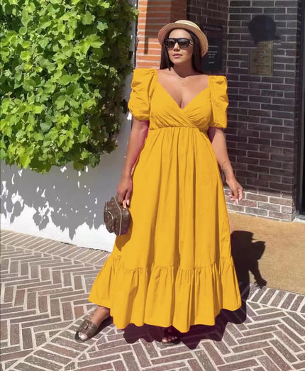 Yellow puff-sleeve maxi dress with V-neck and ruffle hem
