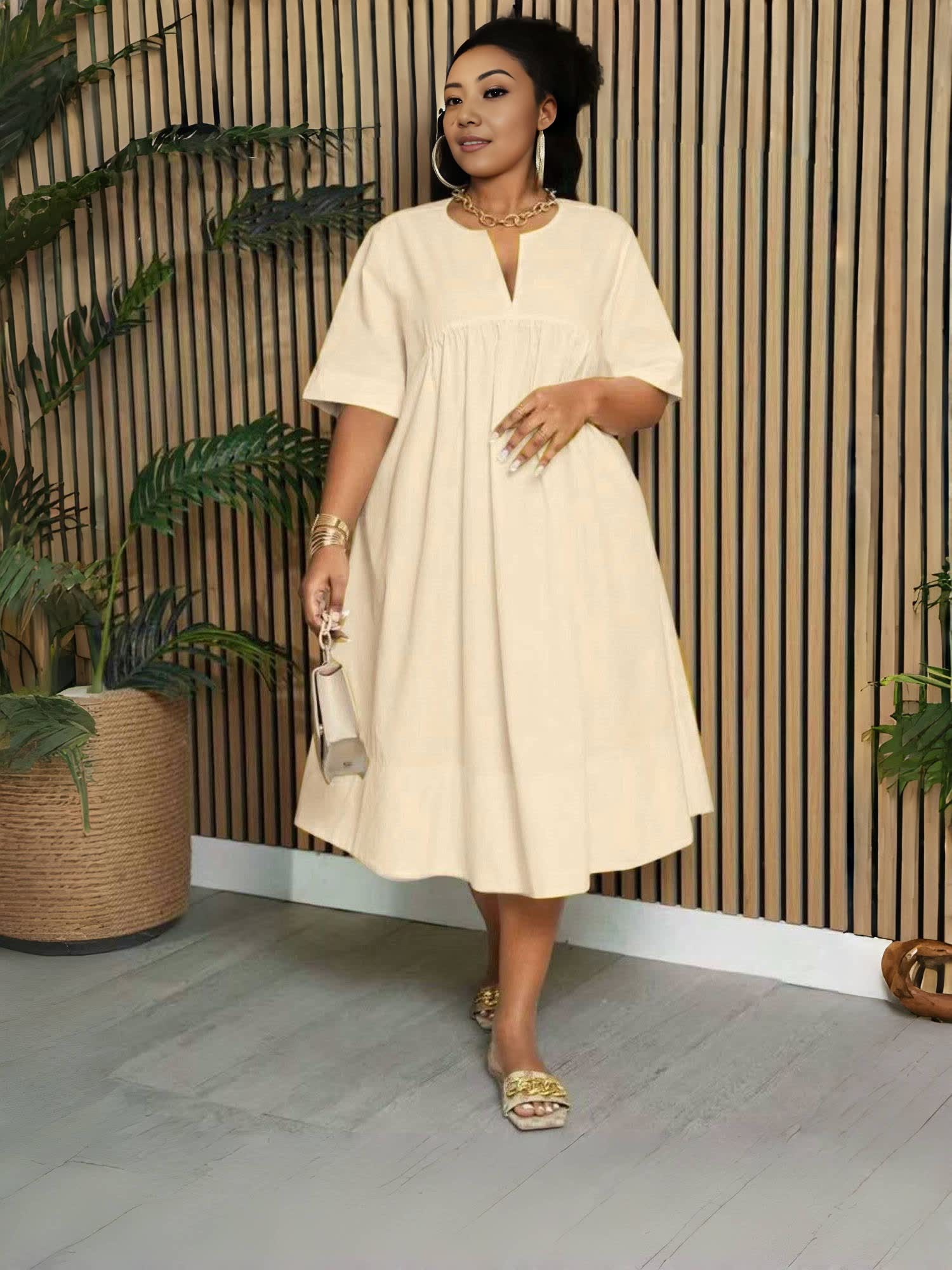 Cream V-neck midi dress with short sleeves and gathered waist, loose fit
