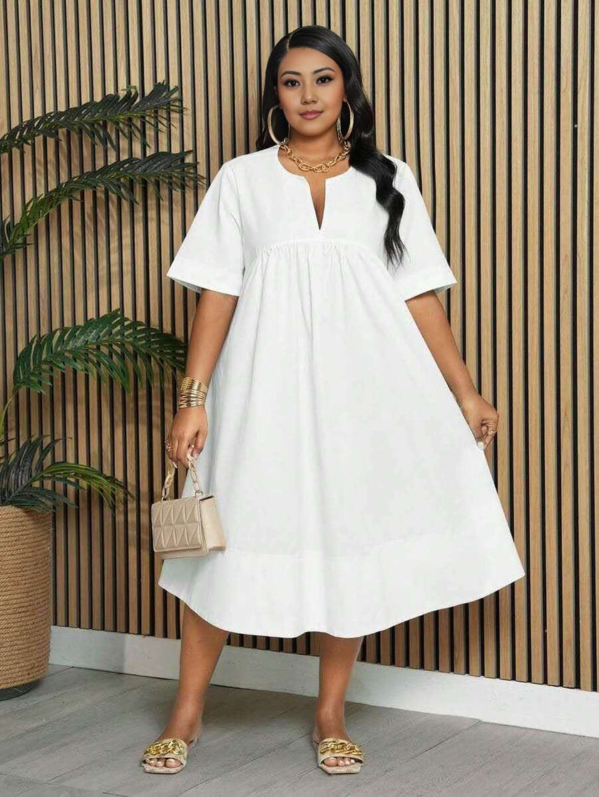 White V-neck midi dress with short sleeves and gathered waist, loose fit