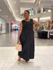 Black sleeveless midi dress with zipper front and adjustable drawstring waist