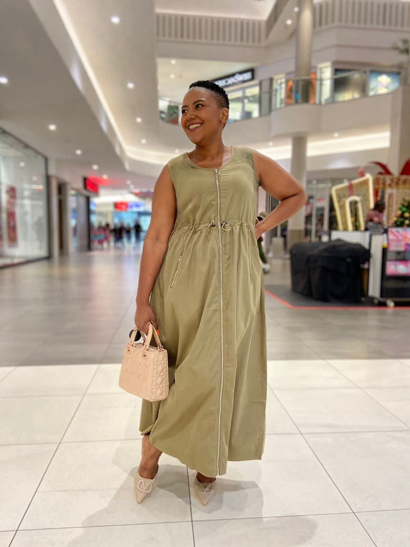 Dark khaki sleeveless midi dress with zipper front and gathered waist drawstring