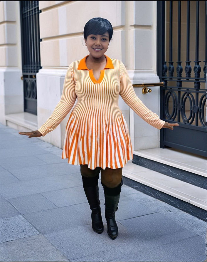 Orange-and-cream vertical stripe pleated knit mini dress, long sleeves, V-neck