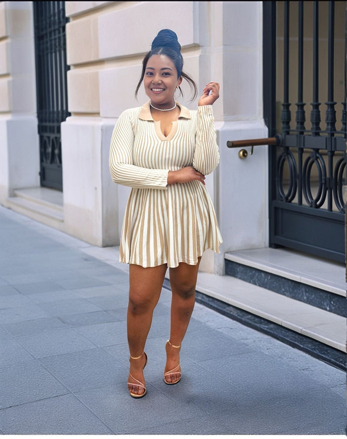 Cream vertical stripe pleated knit mini dress with long sleeves and V-neck
