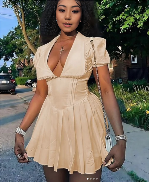 Tan puff sleeve deep V mini dress with lace trim and tiered pleats