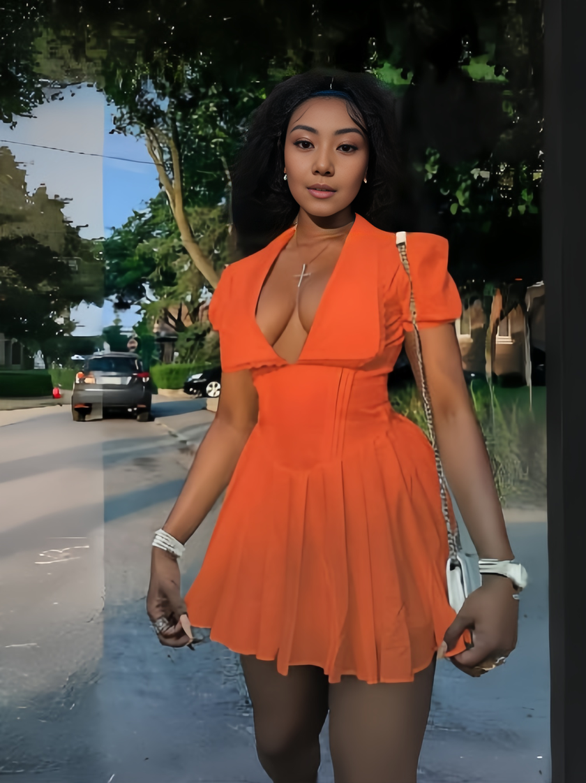 Orange puff sleeve deep V mini dress with lace-trim neckline and pleated skirt