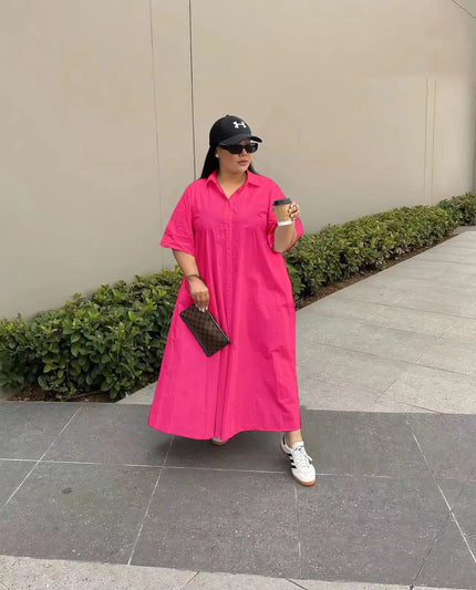 Deep pink maxi shirt dress with short sleeves, button front, and pointed collar