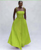 Lime green maxi dress with square neckline, pom-pom strap ties, flared skirt