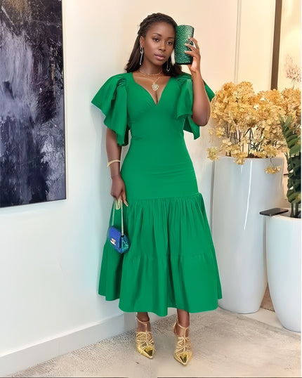 Forest-green tiered midi dress with flutter sleeves, V-neck, and fitted waist