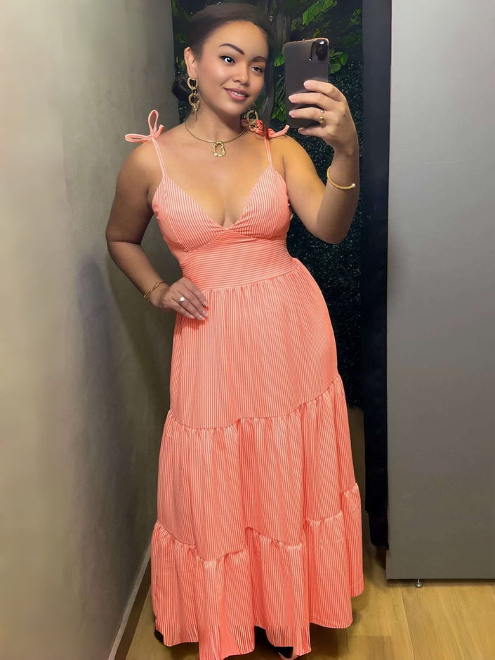 Peach tiered maxi dress with V-neck and thin tie shoulder straps