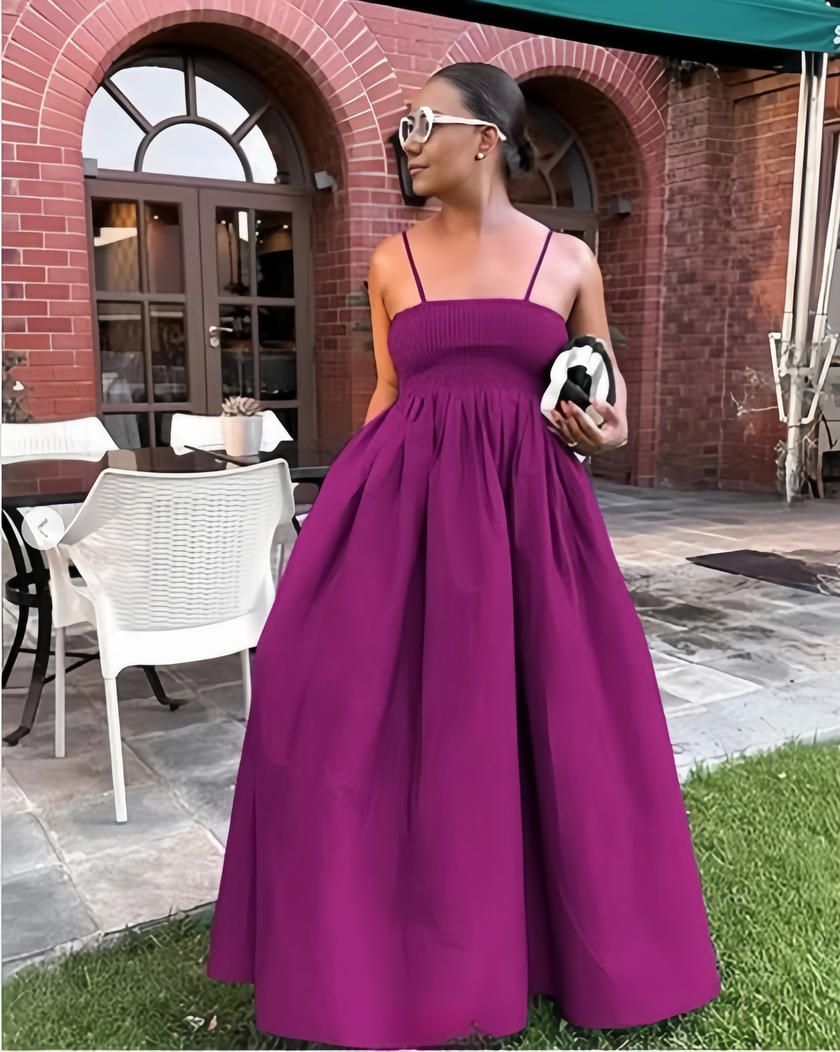 Rose-red pleated maxi dress with spaghetti straps, sleeveless, gathered bodice