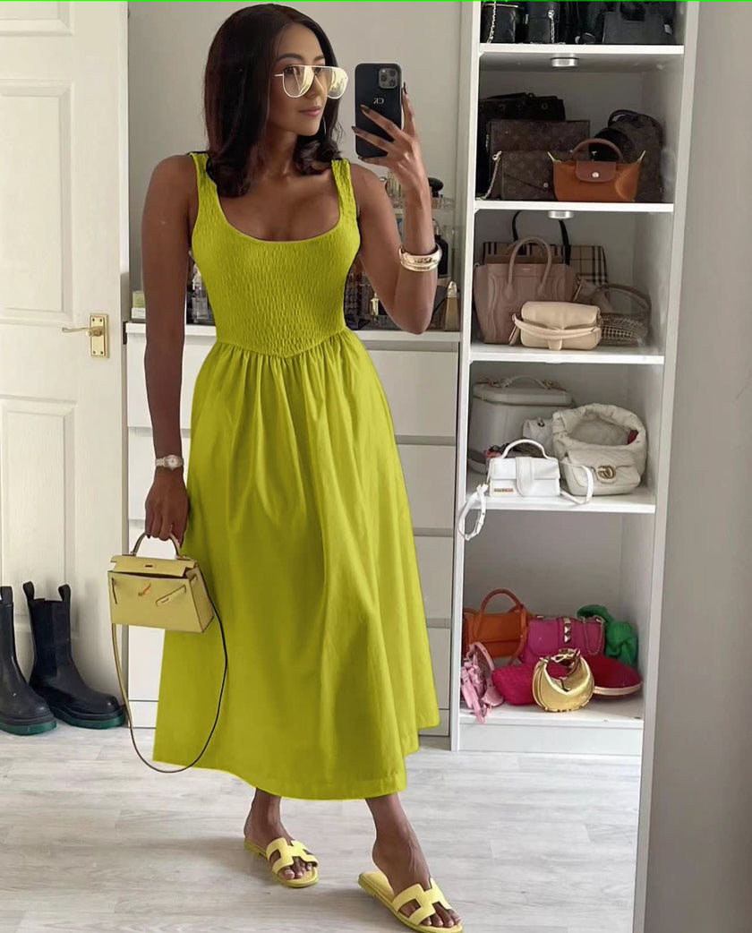 Green-yellow sleeveless textured midi dress with square neckline and flared skirt.