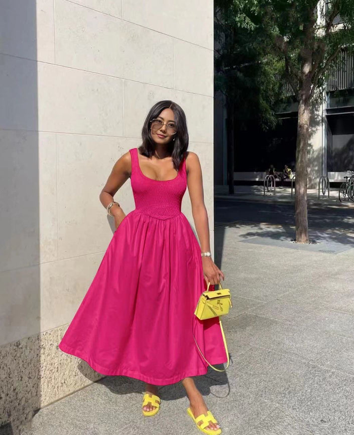 Deep-pink sleeveless midi dress with square neckline and flared skirt.