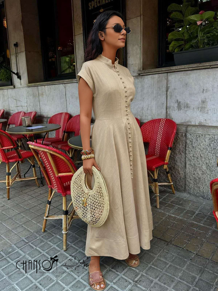 Tan mandarin-collar maxi dress with short sleeves and button-front placket