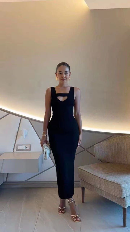 Black ribbed knit midi dress, sleeveless with scoop neckline and fitted shape