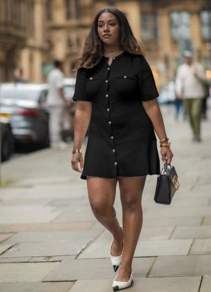 Black knitted mini dress with button front and patch pockets
