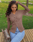 Taupe knit V-neck cardigan with patch pockets and long sleeves