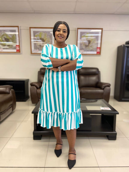 Turquoise and white striped plus size dress with ruffle hem and puff sleeves