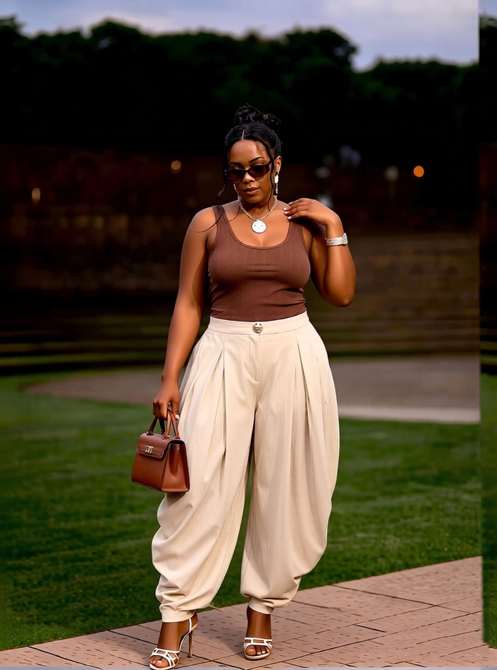 Cream harem pleated trousers with metal waist button and side pockets