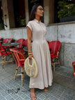 Light mandarin-collar maxi dress with short sleeves and button-front detail