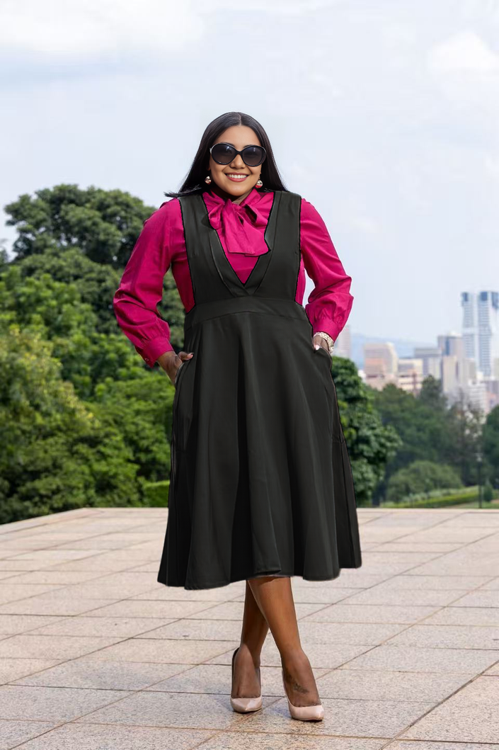 Black suspender midi dress with V-neck bodice and pleated A-line skirt