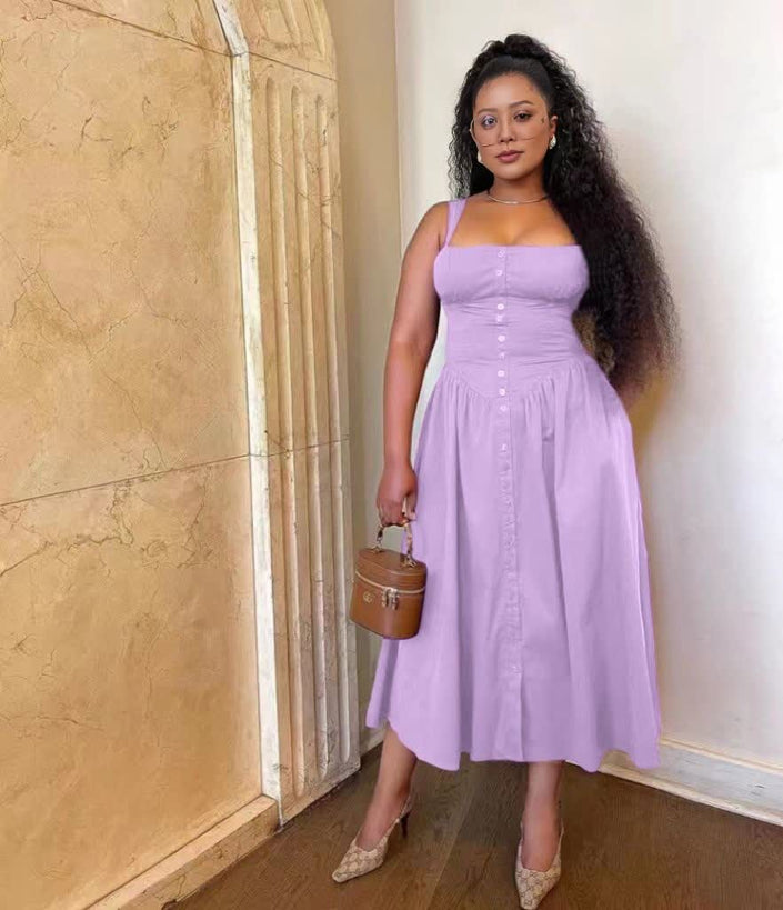 Light purple midi dress with button bodice and gathered, flowing skirt