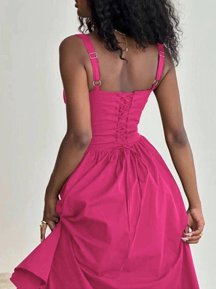 Deep pink midi dress with button bodice and gathered, flowing skirt