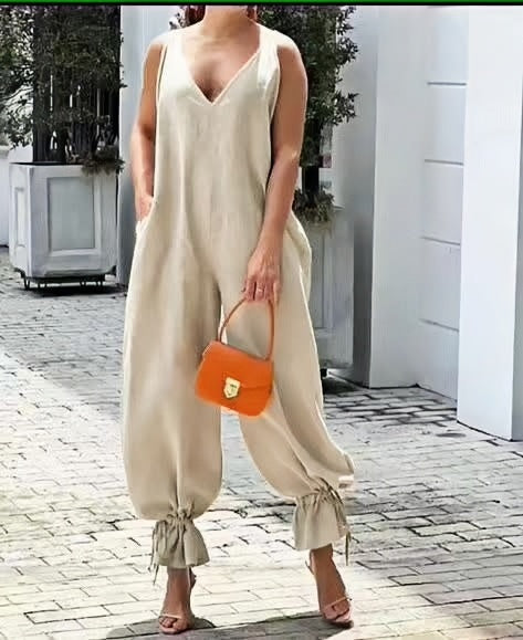 Beige sleeveless V-neck wide-leg jumpsuit with gathered ankle cuffs