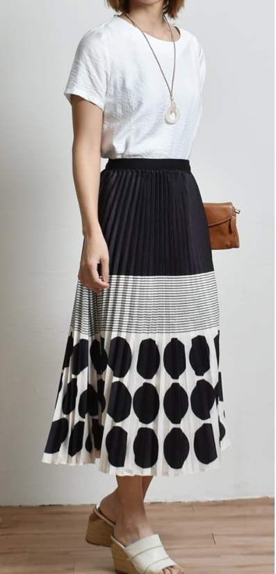 Pleated midi skirt with black-and-white dot and stripe panels