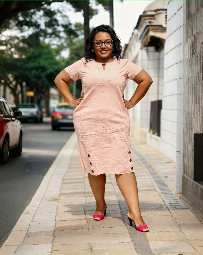 Plus size pink midi dress with short sleeves, V-neck and side button pockets
