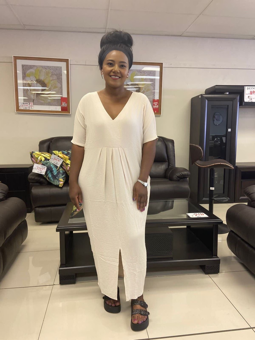 Cream v-neck maxi dress with short sleeves and gathered waist, front slit