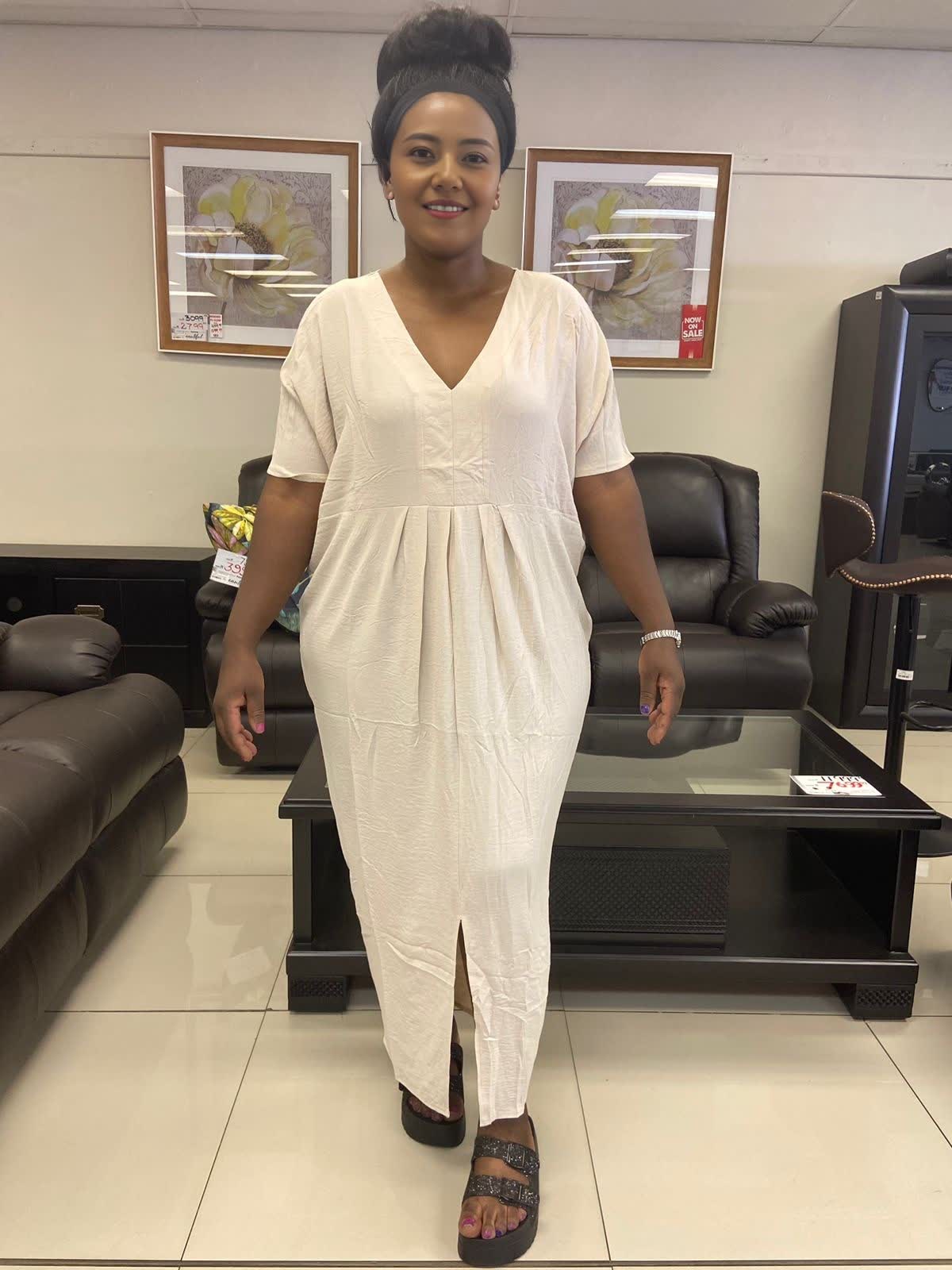 Ivory v-neck maxi dress with short sleeves, gathered waist and front slit
