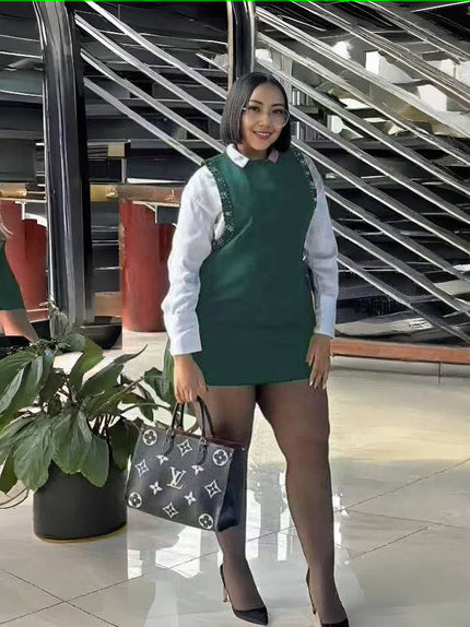 Dark-green layered mini shirt dress with green sleeveless panel and white button-up sleeves
