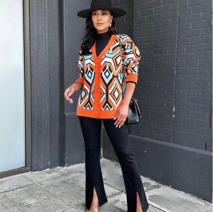 Orange geometric knit cardigan with contrast trim, button-front, long sleeves