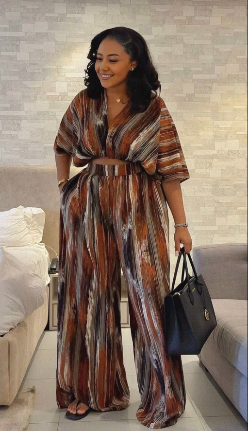 Vertical stripe loose-fit jumpsuit with V-neck, tie waist, short sleeves