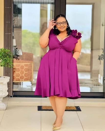 Purple A-line midi dress with floral shoulder detail and V-neck