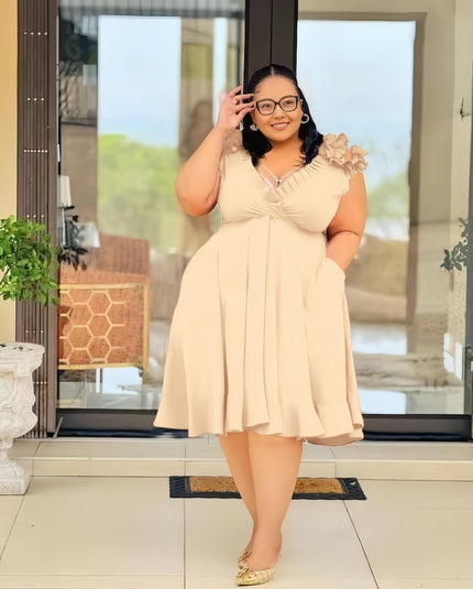 Beige A-line midi dress with floral shoulder detail and V-neck
