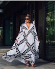 Geometric maxi dress with deep V neckline, black-and-white geometric pattern